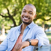 smiling man who has benefitted from cold laser therapy in Richardson