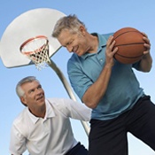 Men playing basketball